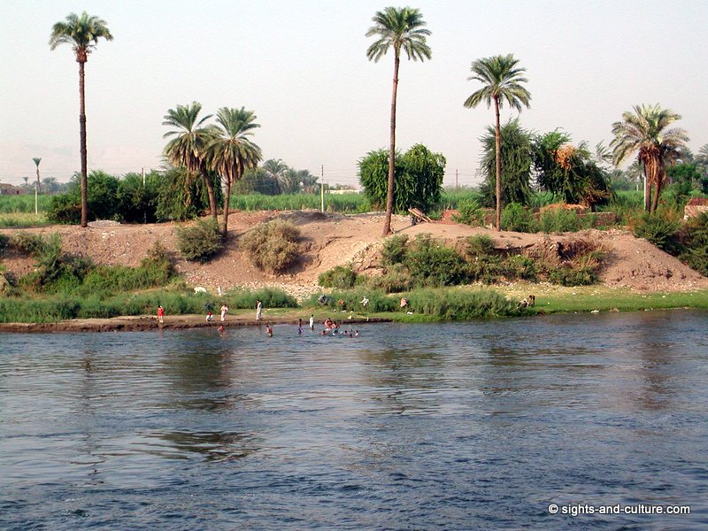 Nile scenery with bathing people