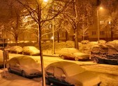 snowy street by night