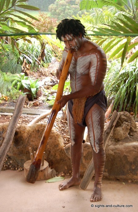 Aboriginal playing the didgeridoo at Nature Park Rainforeststation Kuranda