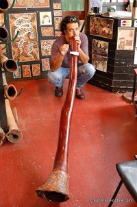 Aboriginal playing the didgeridoo